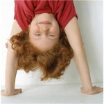 eustress shown by girl learning a handstand