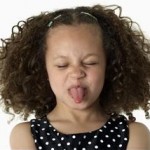 Unorthodox Life Tips represented by girl sticking out tongue