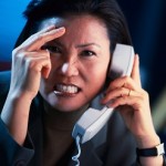 Frustrated Businesswoman on the Phone